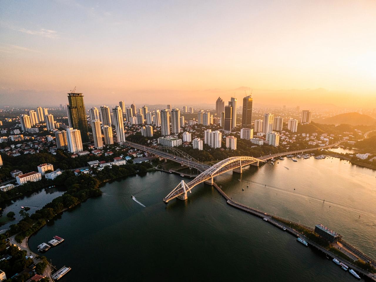 Aerial view of the Lagos skyline and lagoon at golden hour
